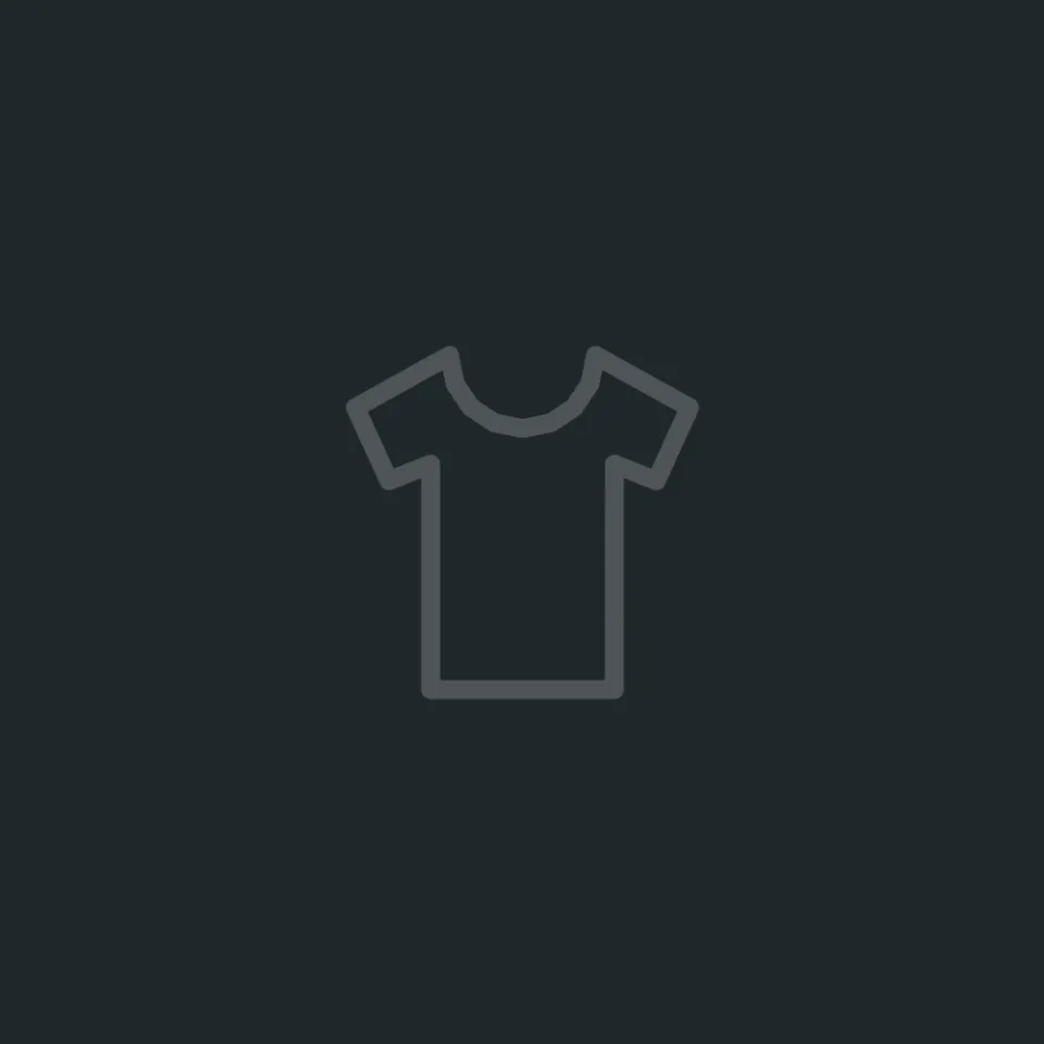 A faint outline of a t-shirt on dark slate, the place for the next piece of Drop 01